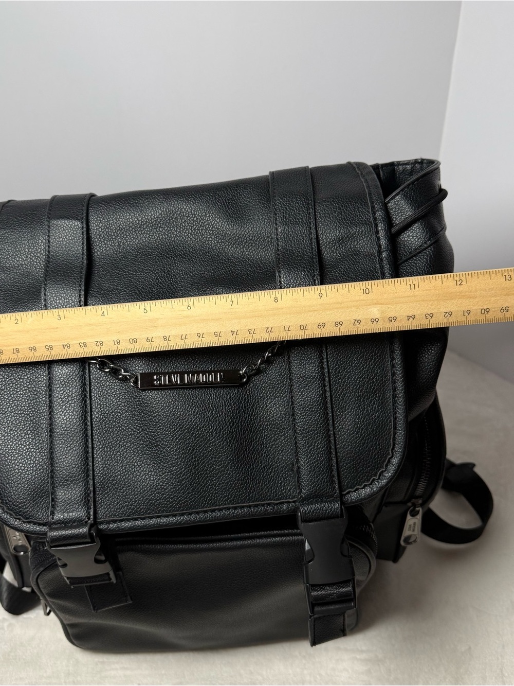 Steve Madden Black Pebbled Faux Leather Drawstring Backpack with Chain Trim - Picture 7 of 8